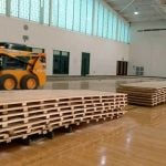 Removing the basketball floor at LeMoyne College